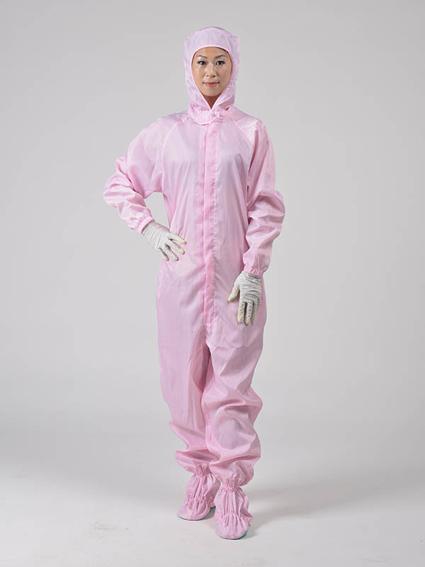 Hooded coverall with shoe covers connected